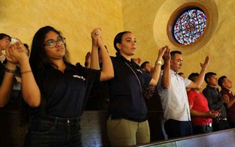 Latino Catholics recite the Lord's Prayer during Mass at the Labor Day Encuentro gathering at Immaculate Conception Seminary in Huntington, N.Y., Sept. 3, 2018. (CNS photo/ Gregory A. Shemitz, Long Island
Catholic)